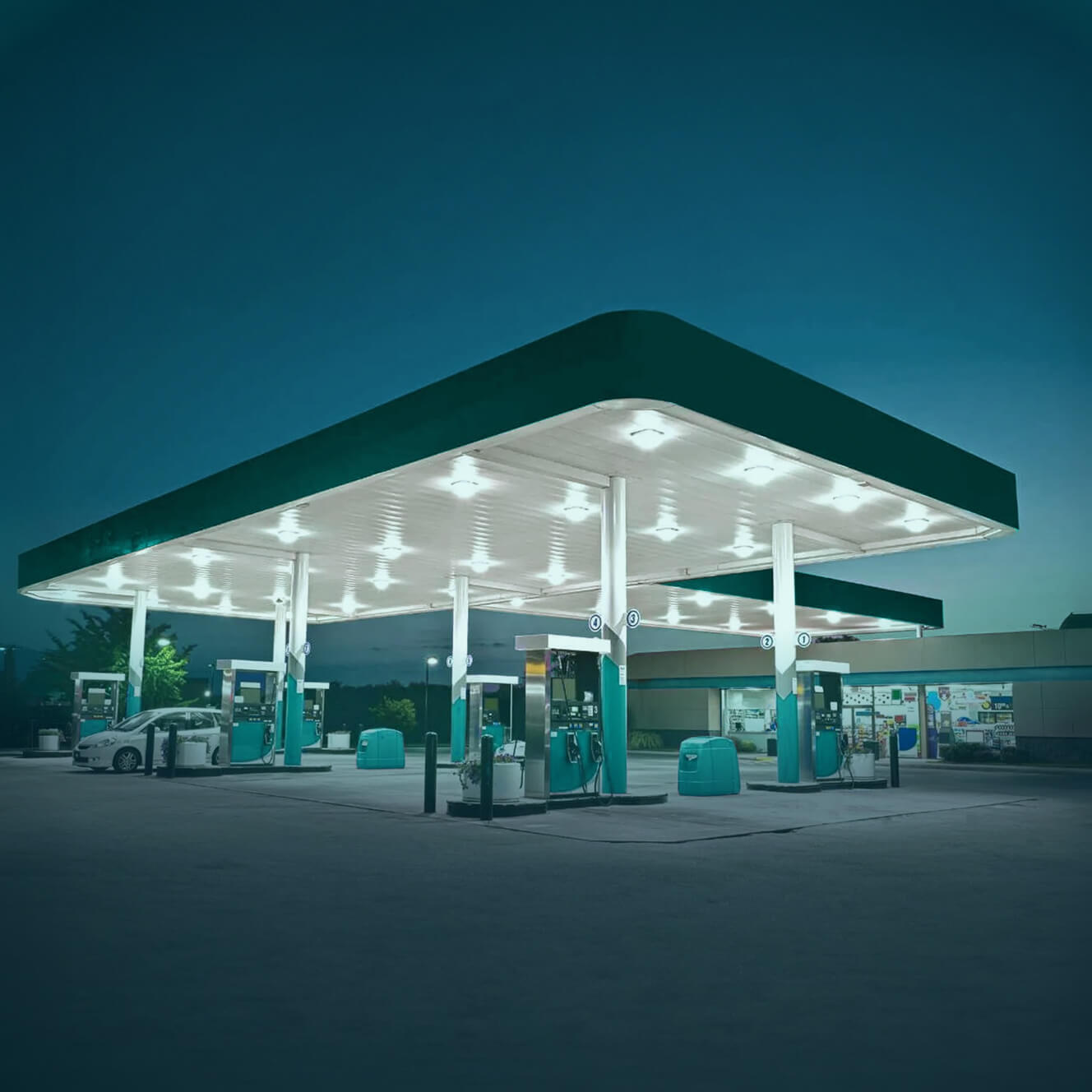 Service station forecourt at dusk