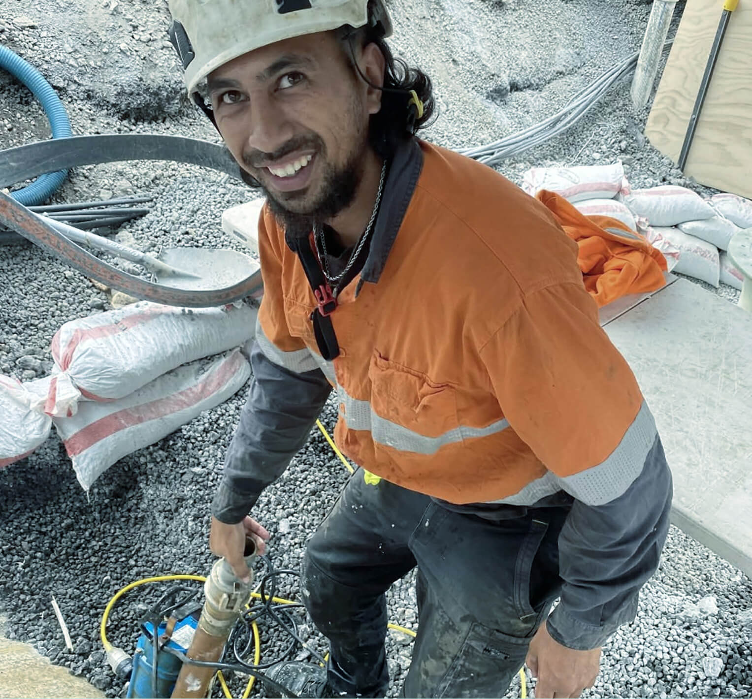 Technician installing tank monitoring and leak detection equipment