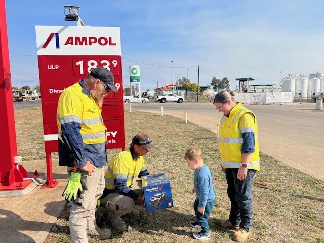 TRL crew outside an Ampol service station