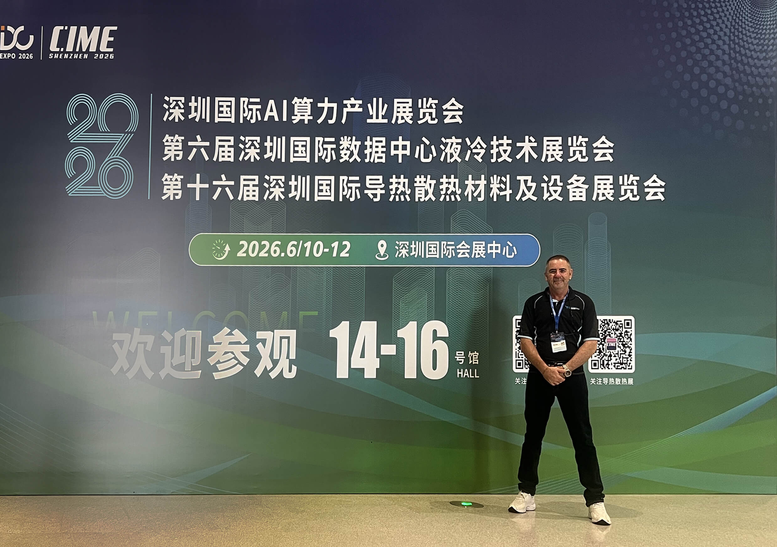 Daniel Mulally standing in front of the 6th Shenzhen International Data Center Liquid Cooling Technology Exhibition (CIME 2026) banner